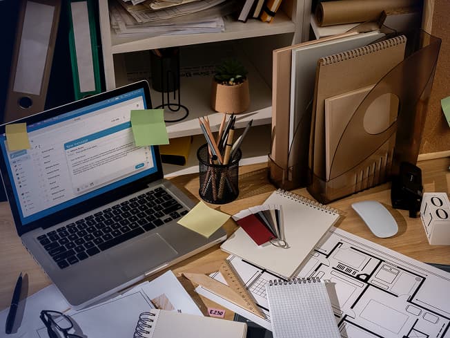 Professional workspace displaying desktop publishing software adapting a website layout for text expansion and right-to-left language formatting. | Travod