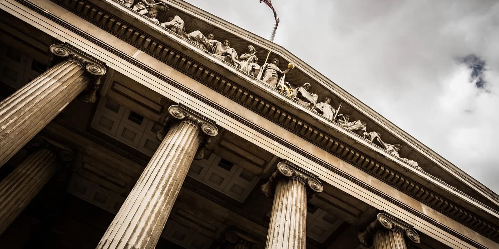 Digital law and legal technology icons displaying scales of justice on a tablet interface